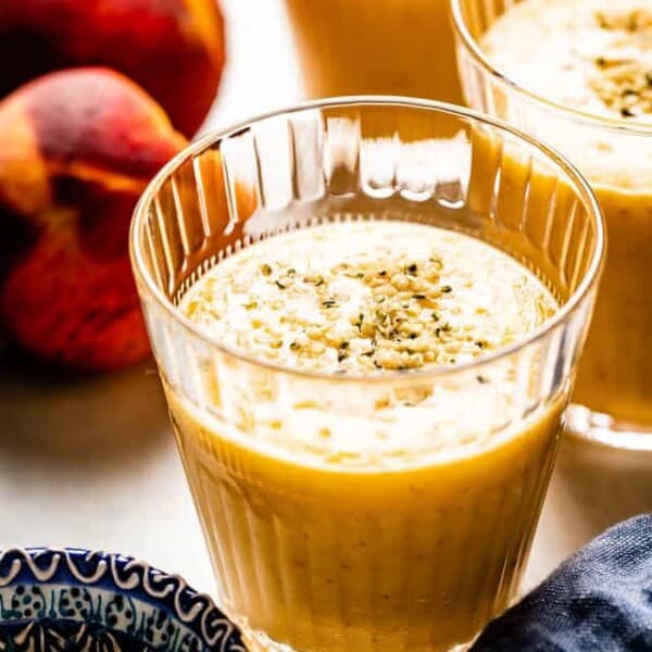 Peach mango smoothie from the side view.