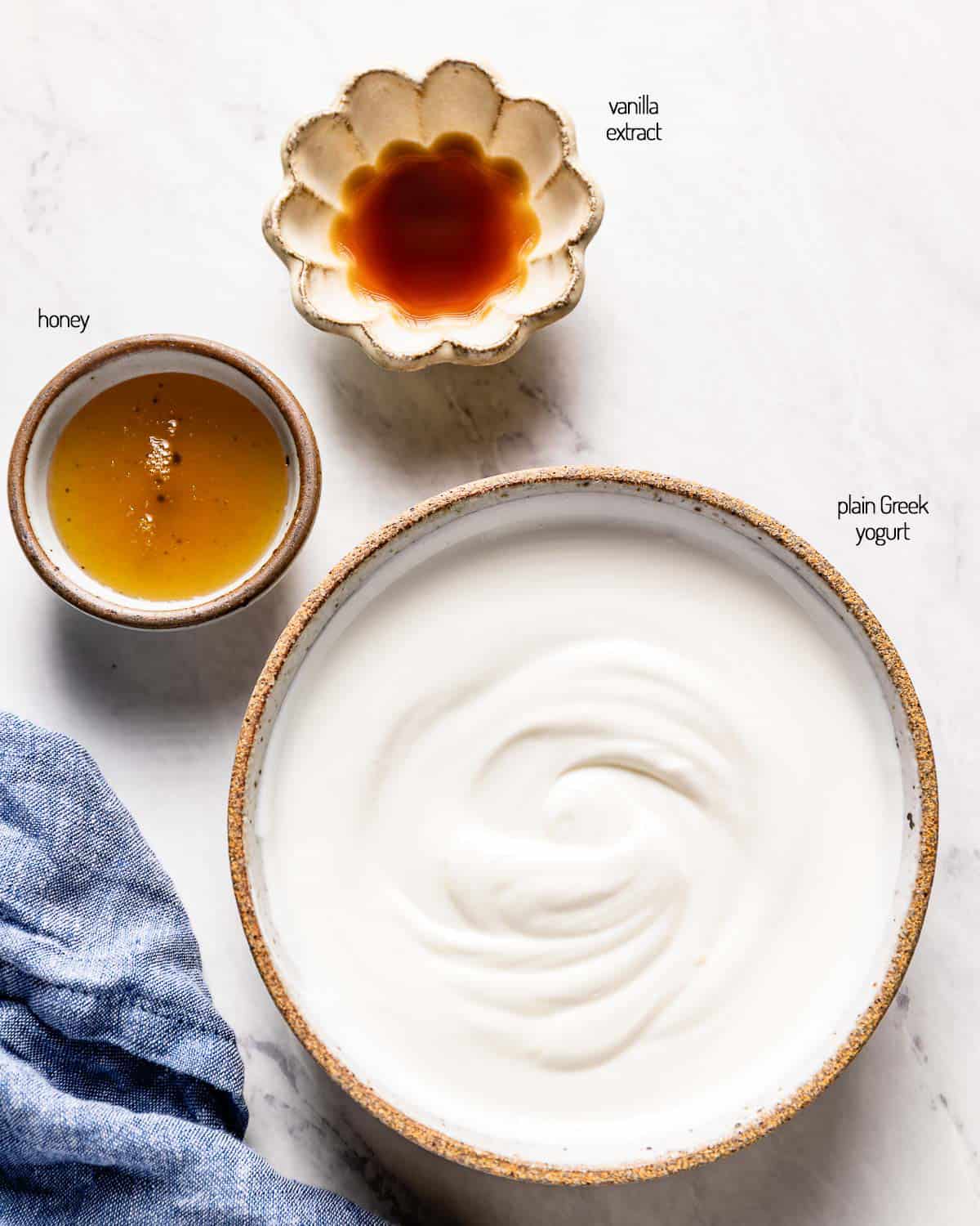 ingredients for the recipe in small bowls from the top view