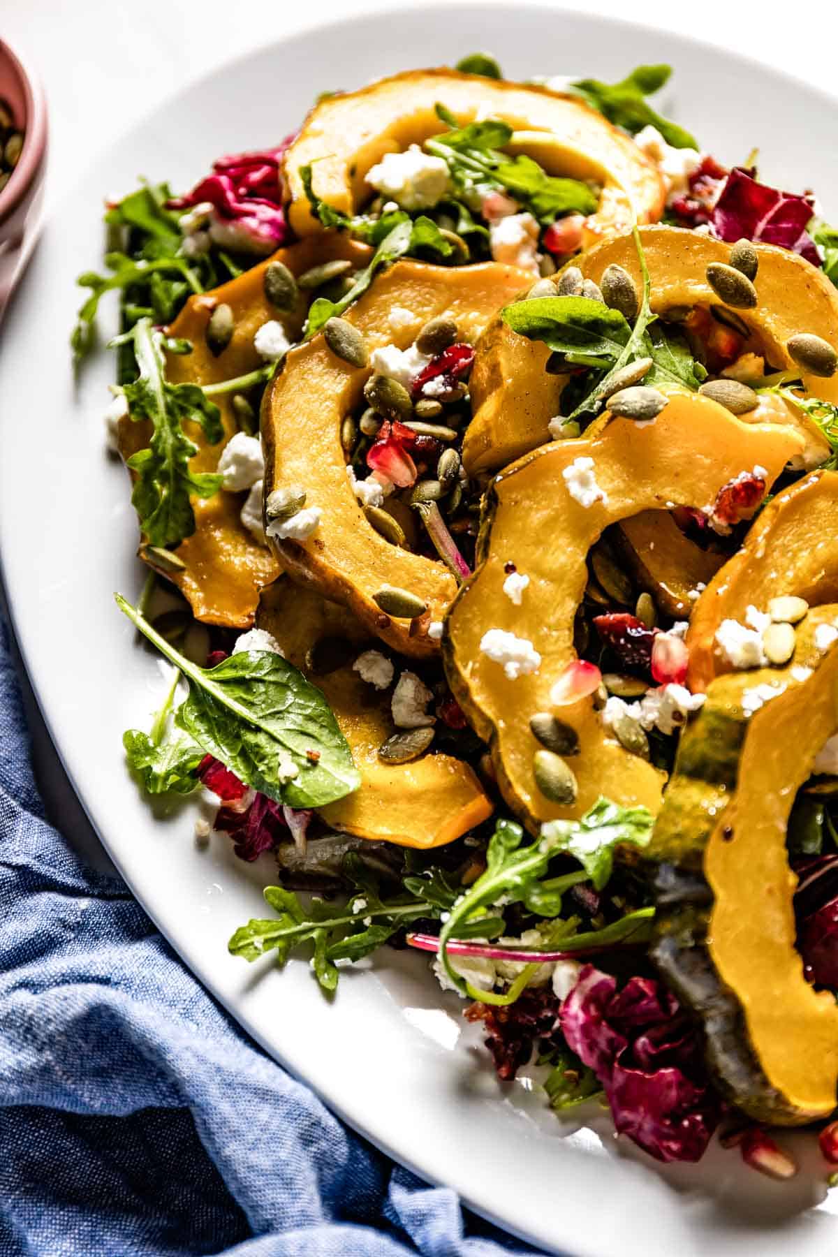 Acorn squash salad in an oval plate.