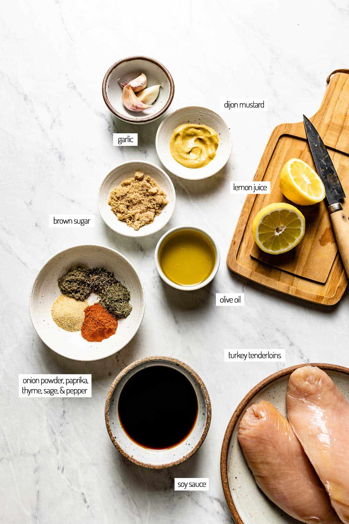 Ingredients for a marinade for turkey in bowls from the top view.