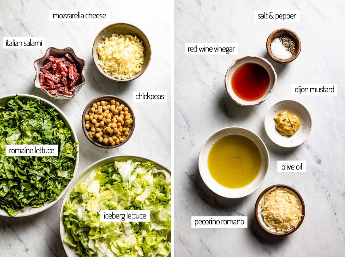 Ingredients for an Italian chopped salad in bowls from the top view.