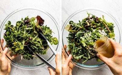 Person drizzling the salad with the dressing and tossing it.