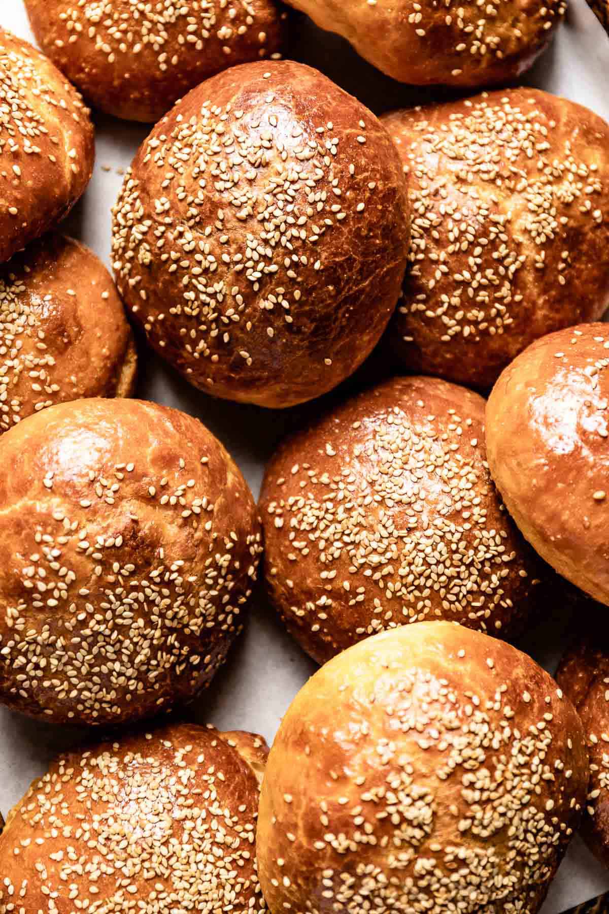 Dinner rolls garnished with sesame seeds from the top view.