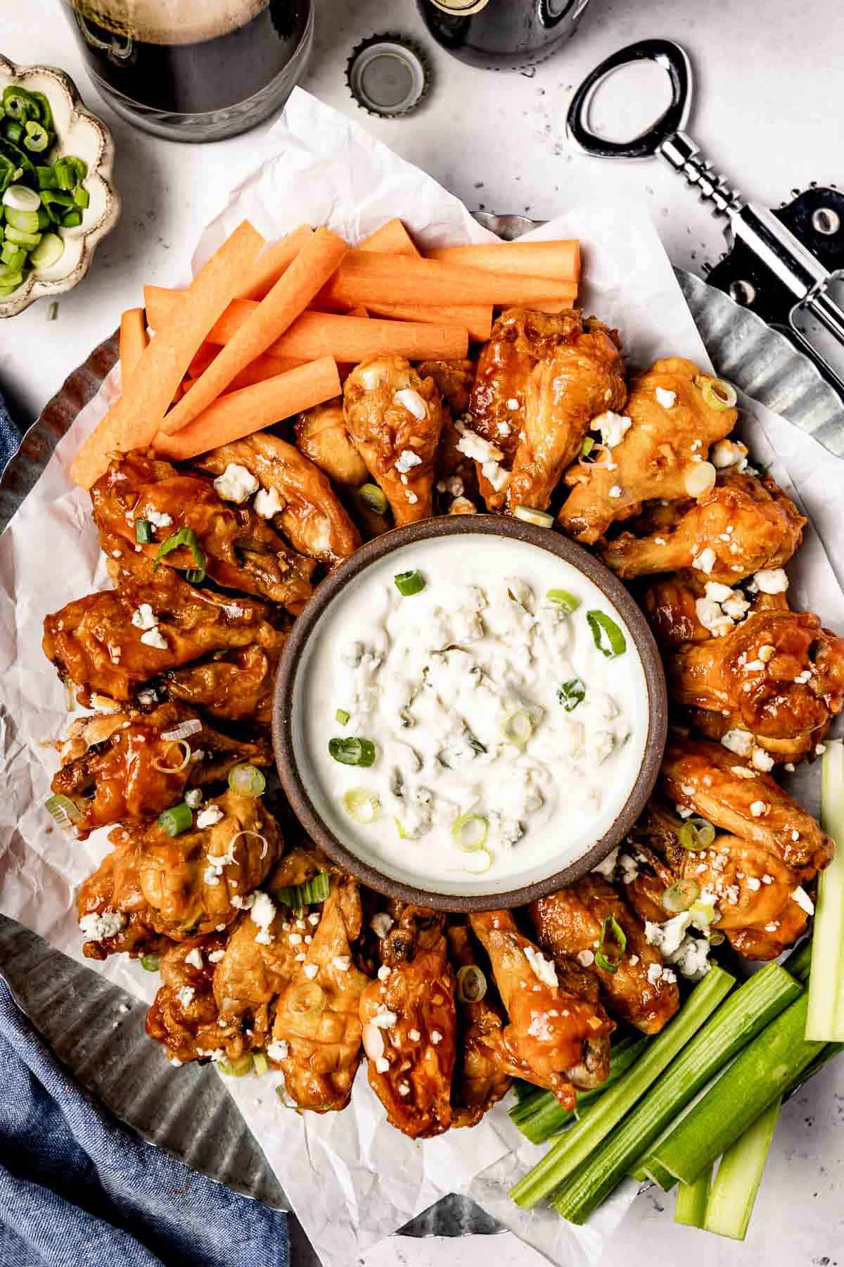 One of the most popular game day recipes, chicken wings served with ranch dressing.