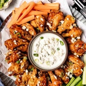 Slow baked chicken wings with blue cheese sauce.