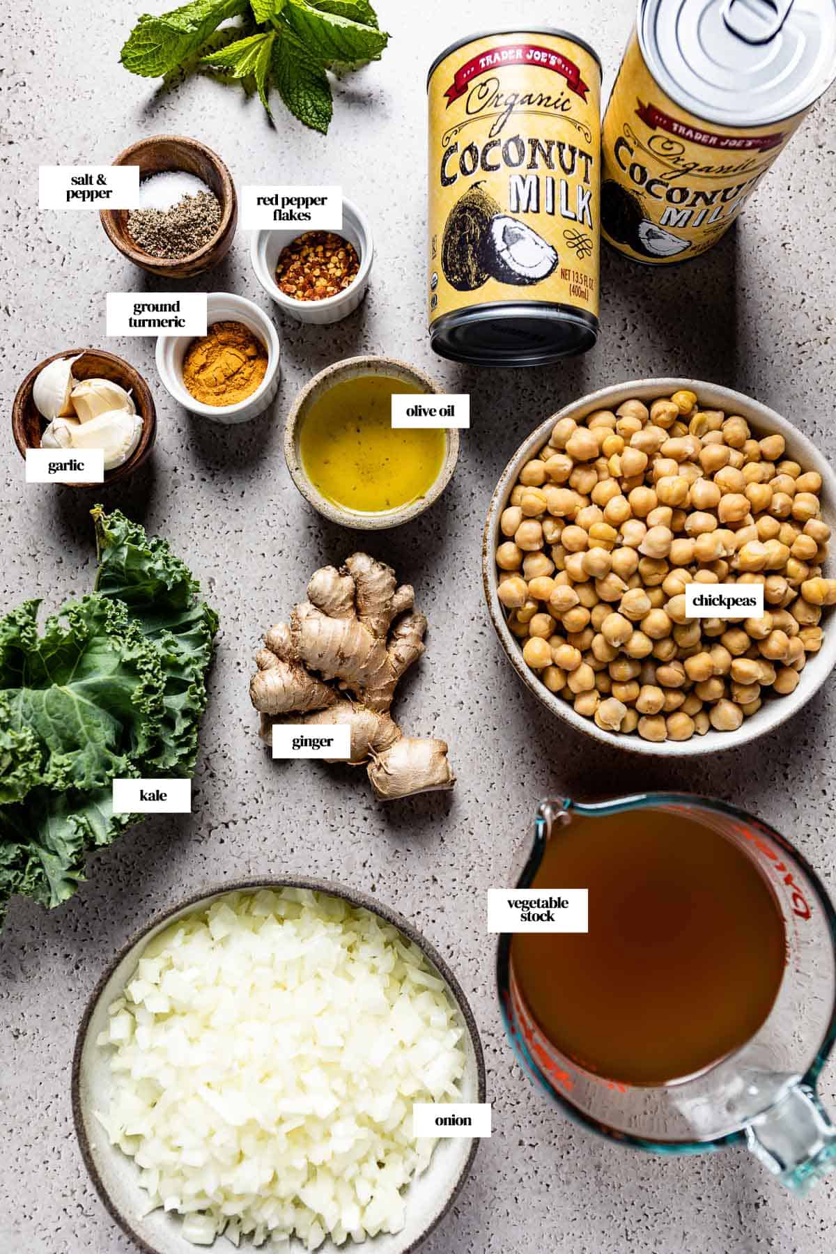 Ingredients for chickpea stew by Alison Roman are in small bowls from the top view.