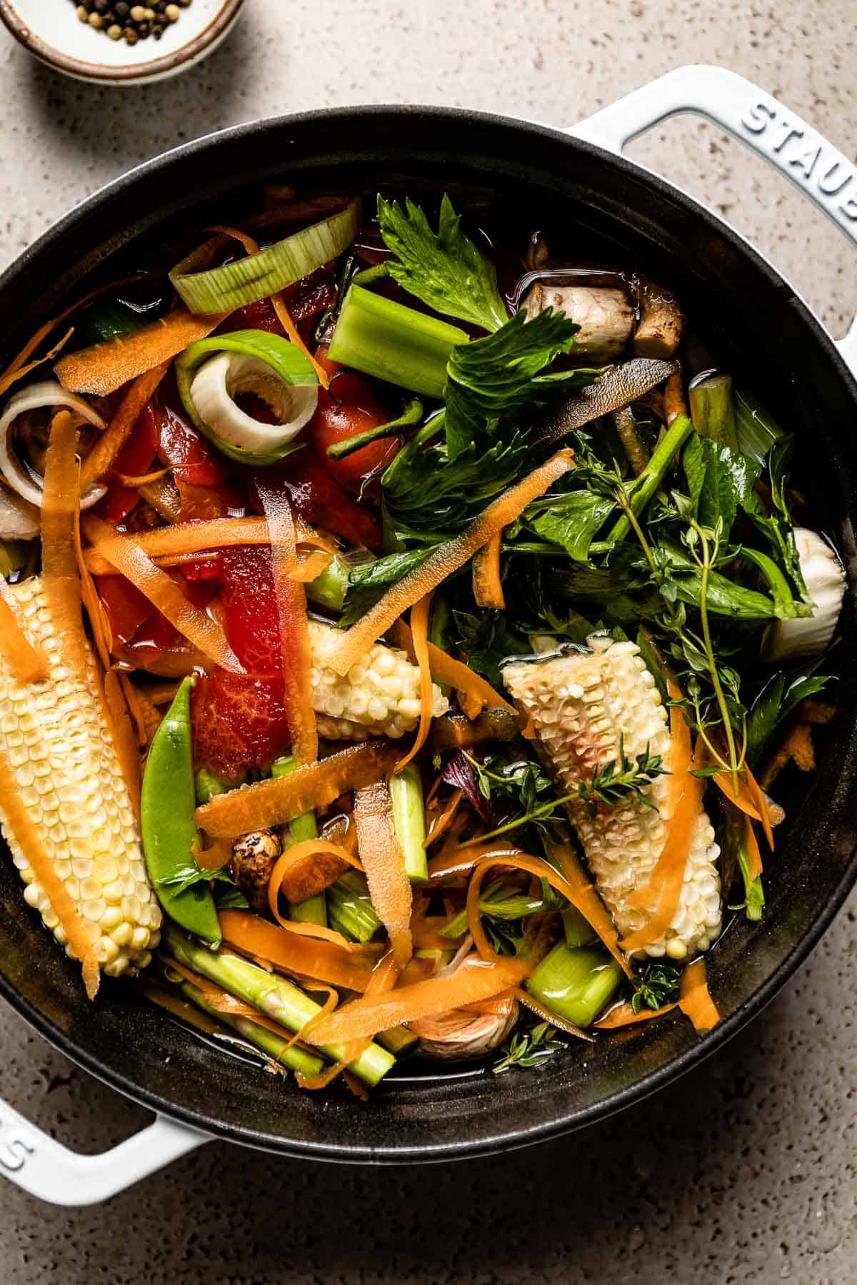 Kitchen scraps placed in a pot to make vegetable broth.