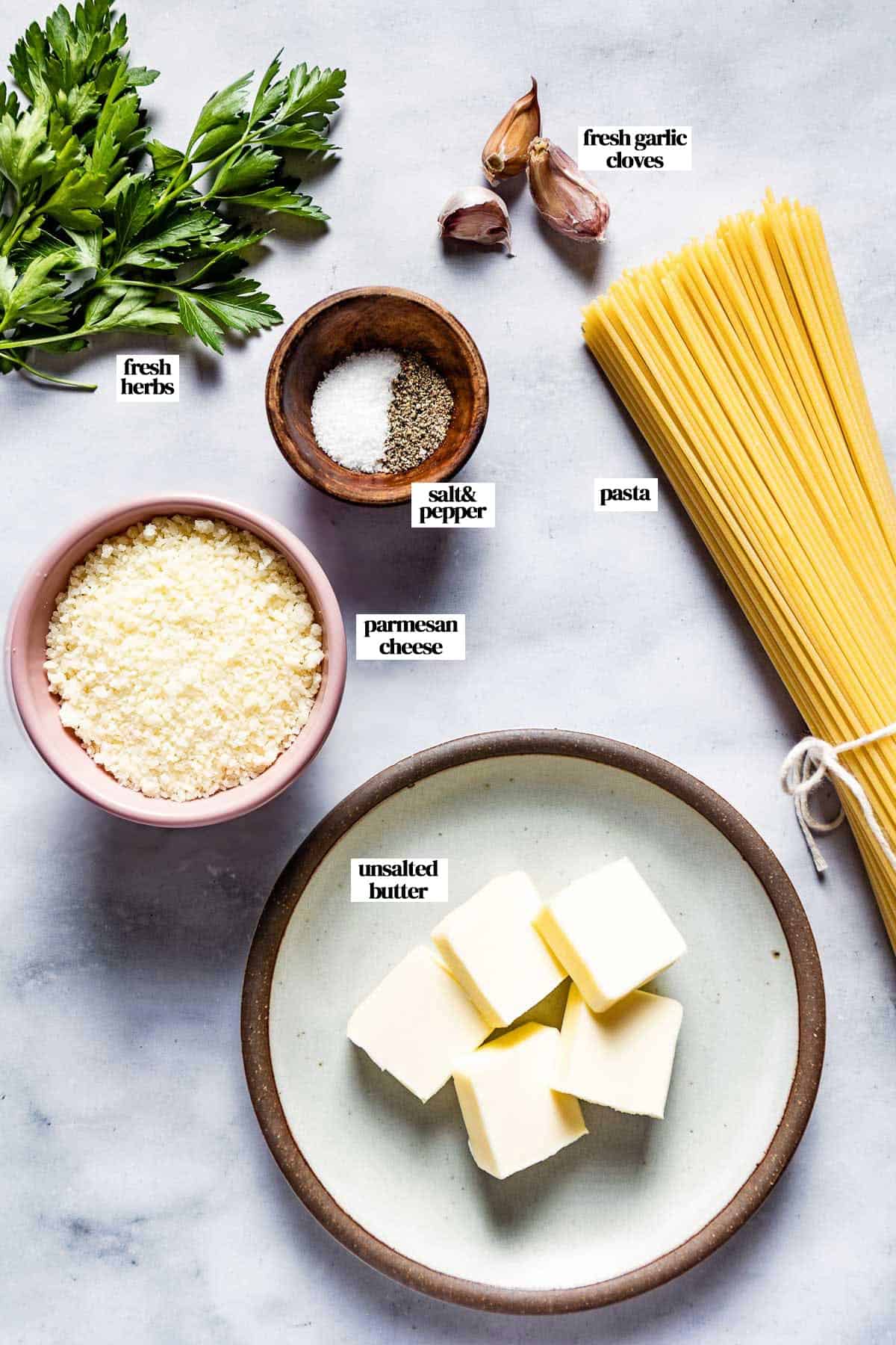 Ingredients for pasta with butter garlic from the top view.