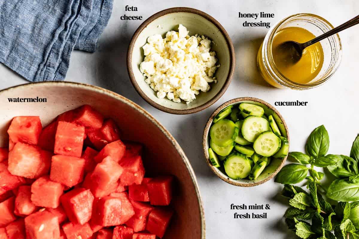 The ingredients for watermelon cucumber salad from the top view.