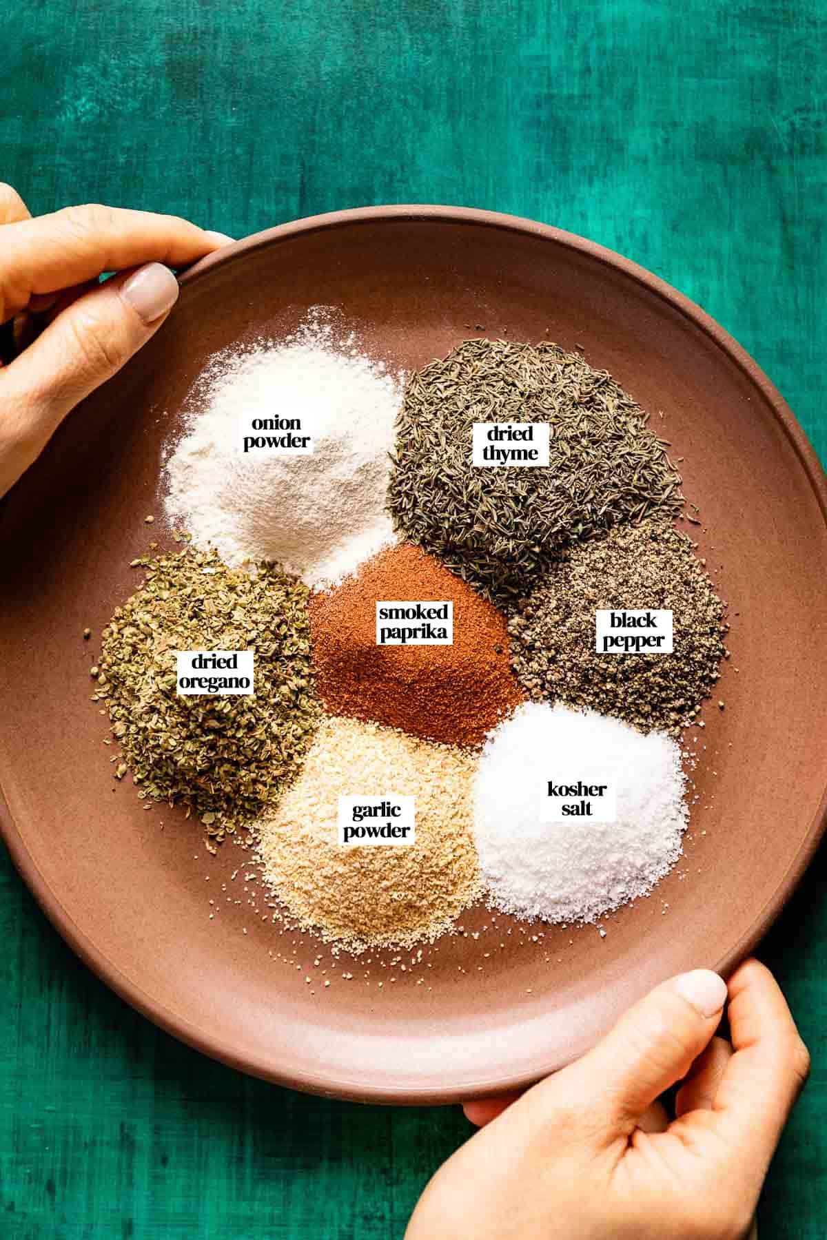 An image showing what spices are in blackened seasoning with text on each spice.
