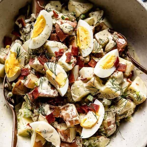 Red skin potato salad in a bowl from the top view.