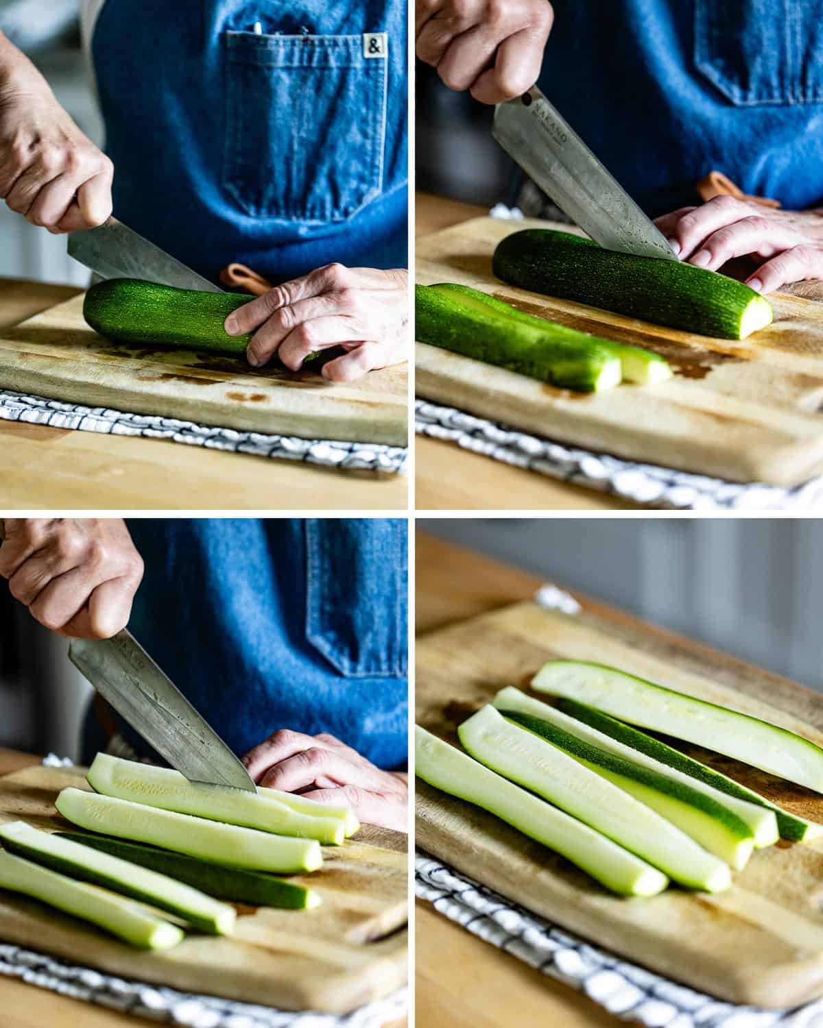 A person cutting zucchini into spears.