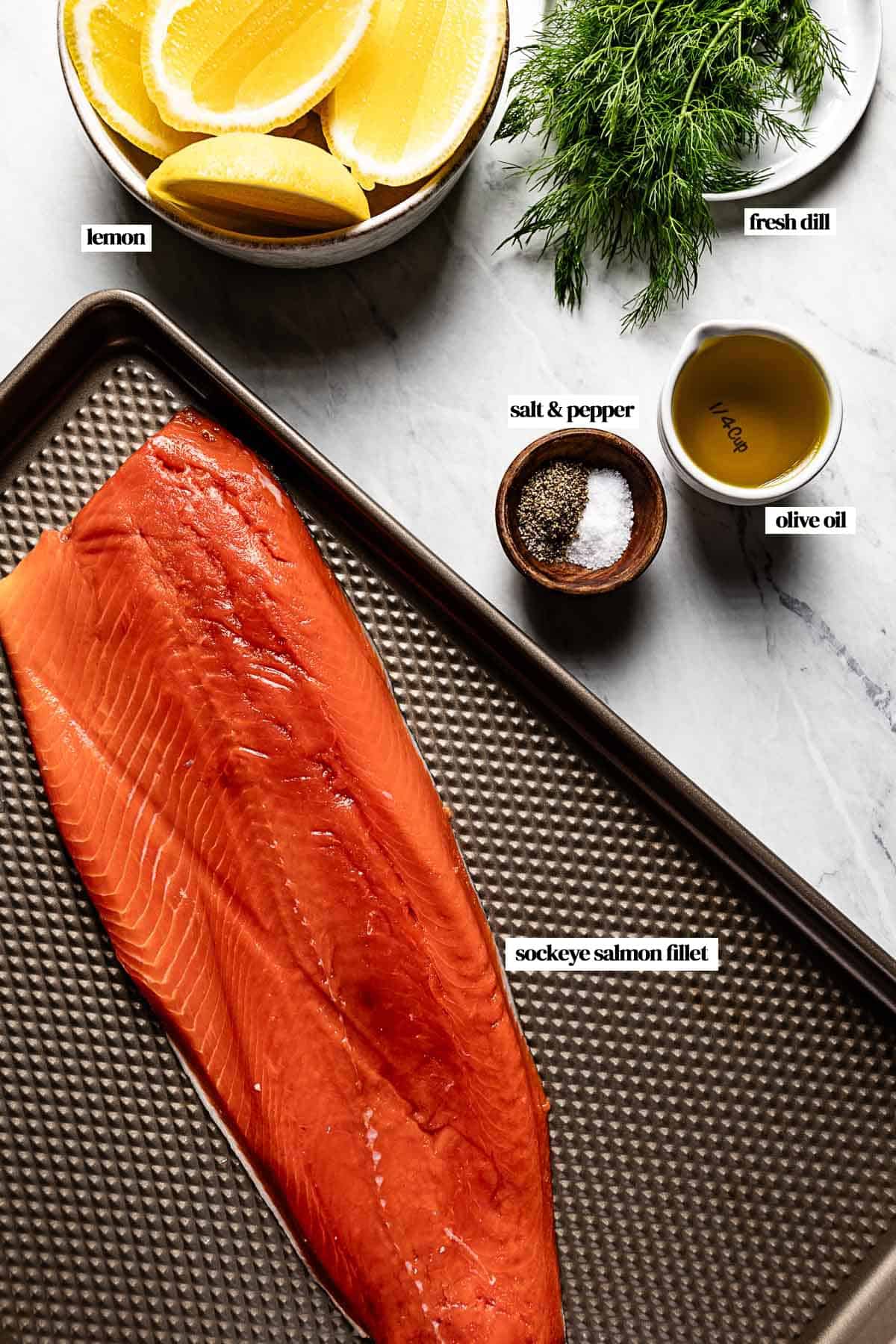 Ingredients for grilling sockeye salmon on a marble.