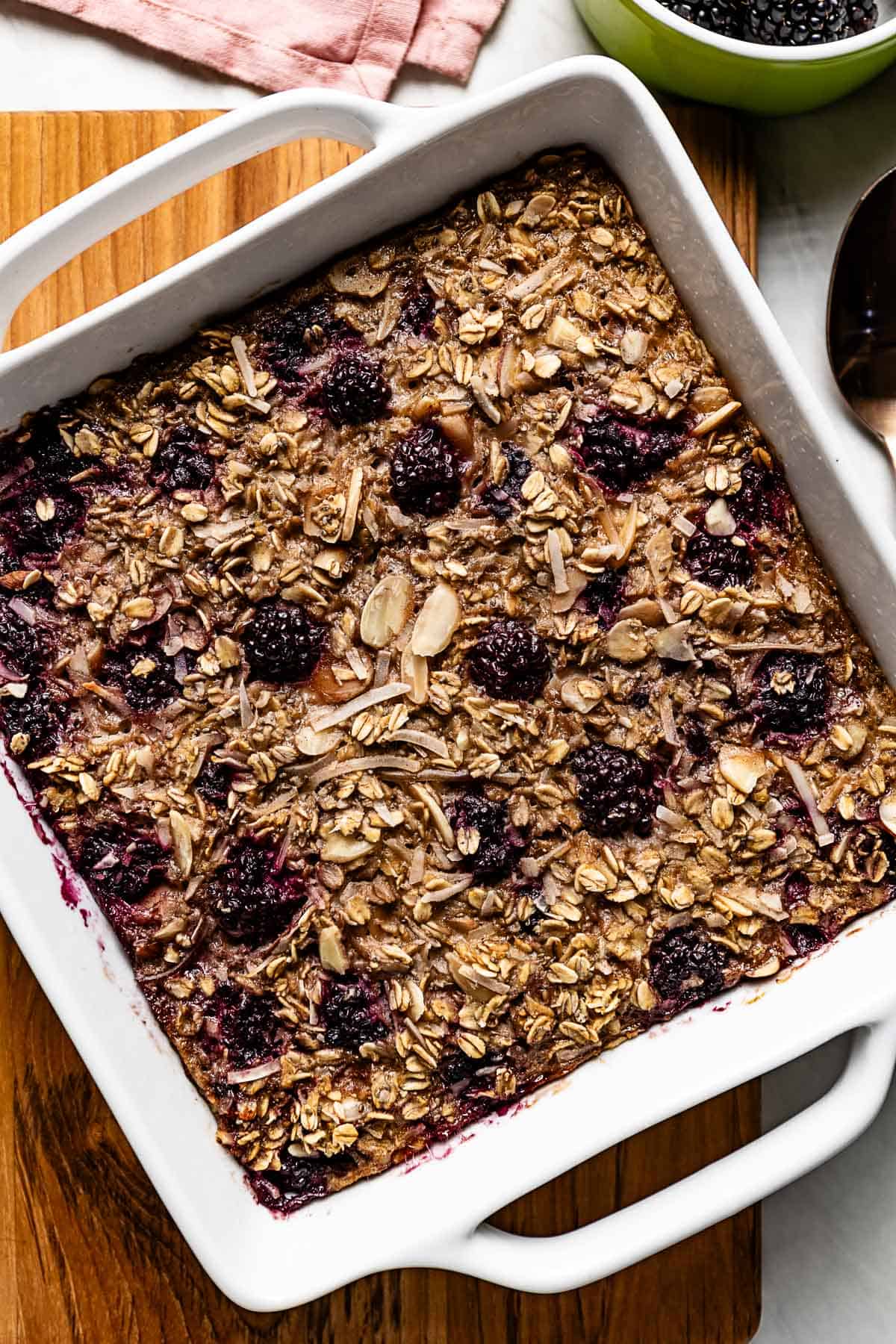 Baked Blackberry Oatmeal in a square baking dish from the top view.