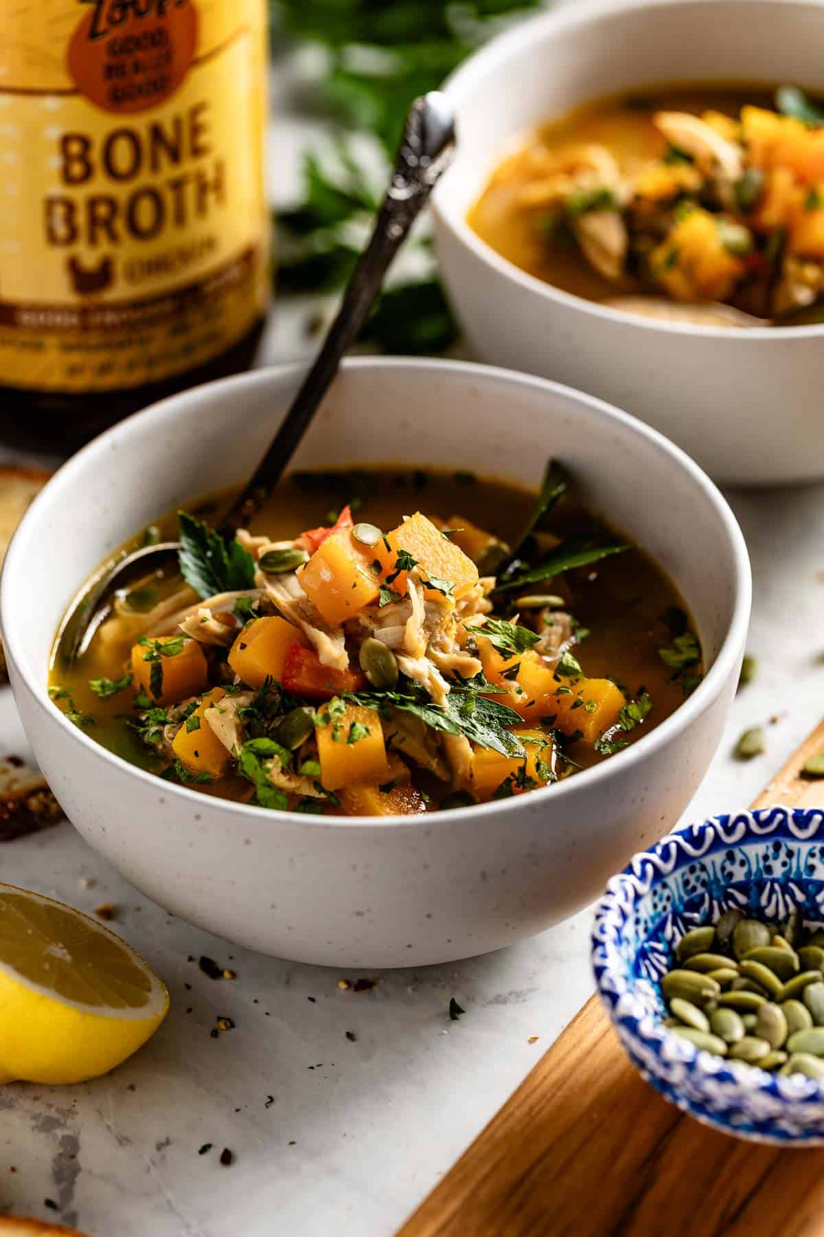 Organic chicken soup with bone broth & fresh garden herbs + home