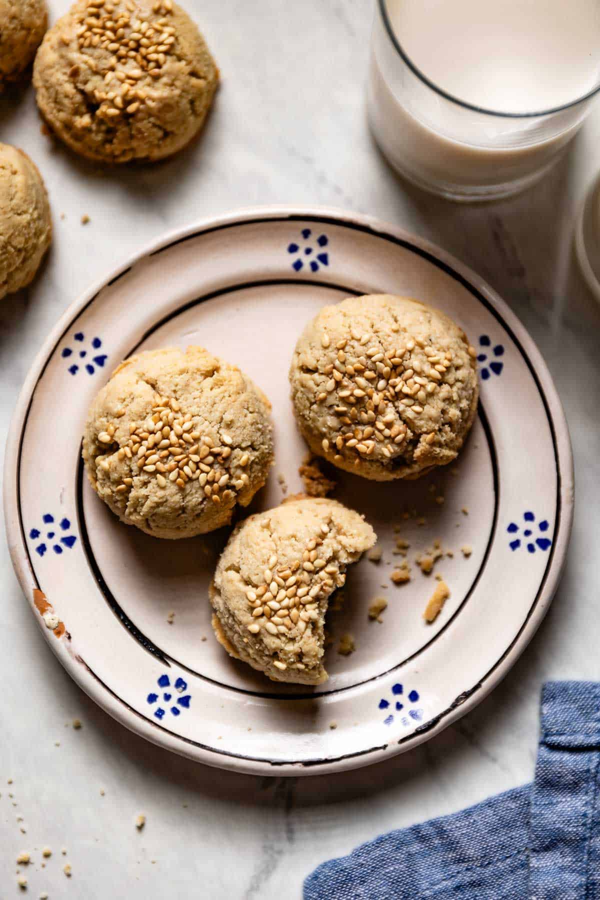 Refined sugar free tahini cookies on a small plate from the top view.