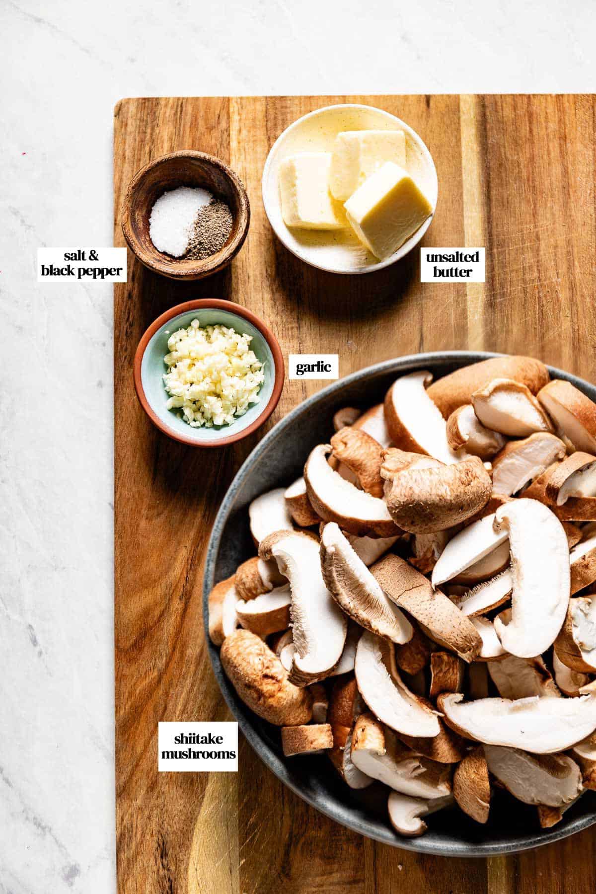 Ingredients needed for the recipe on a wooden board.