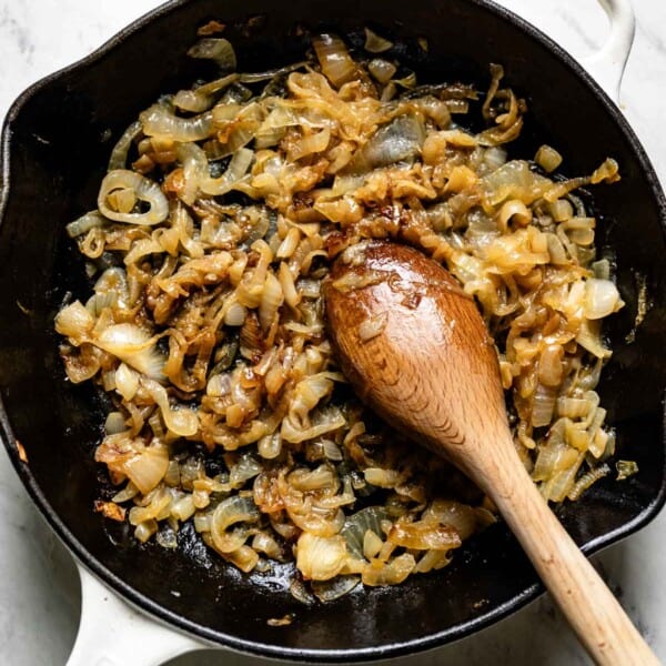 Caramelized onions in a skillet from the top view.