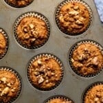 Gluten free almond flour carrot cake muffins in the muffin tin from the top view.