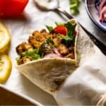 Chicken shawarma wrap with text on the image.