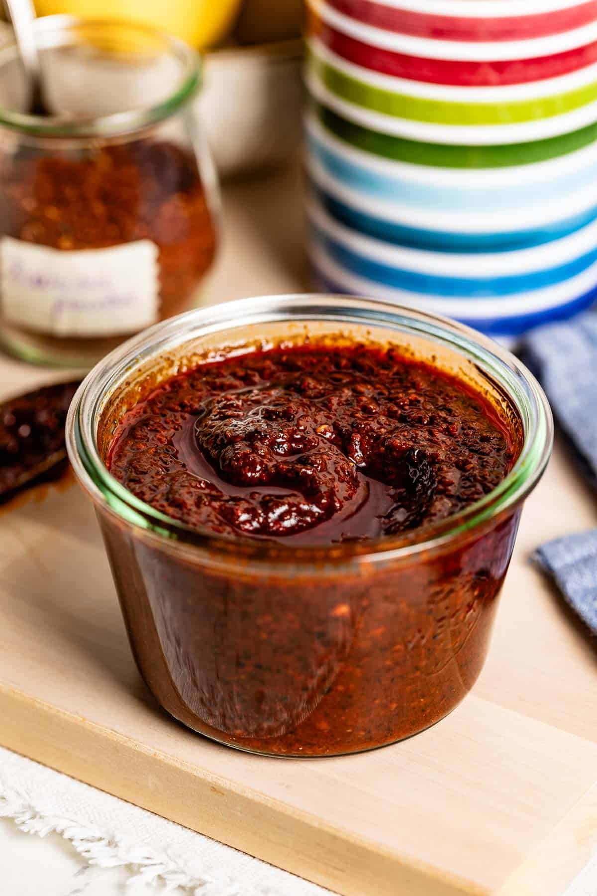 Harissa paste made by using harissa powder in a jar.