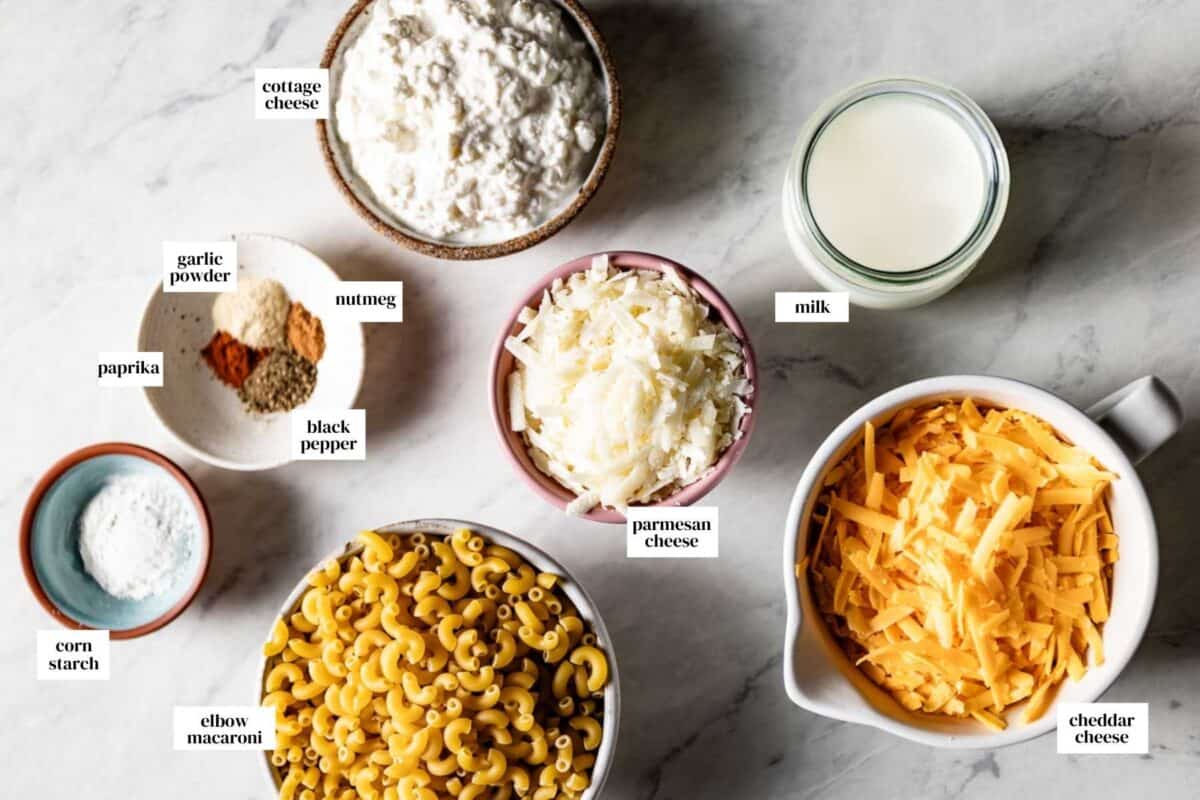 Ingredients for cottage cheese mac and cheese in small portions from the top view.
