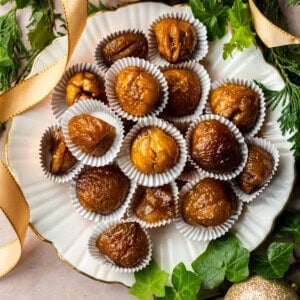 Candied chestnuts on a plate.
