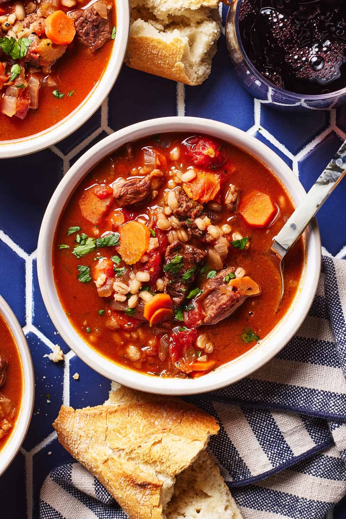 Barley and beef soup in a bowl from the top view.