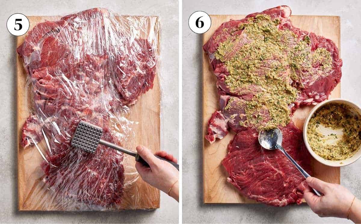 Boneless leg of lamb covered in plastic wrap being pounded with a meat mallet to even thickness, then spread with Dijon herb seasoning rub.