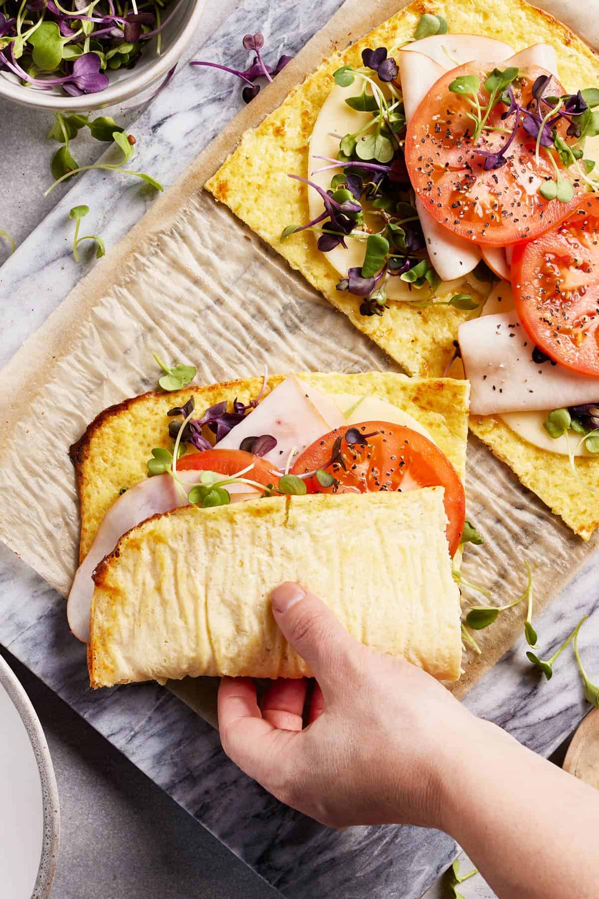 Cottage cheese flatbread turned into a sandwich wrap from the top view.