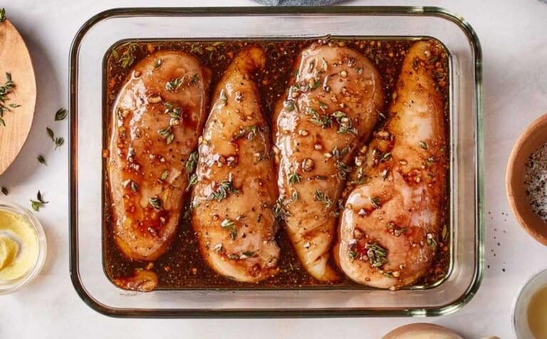 Chicken marinating in balsamic marinade.