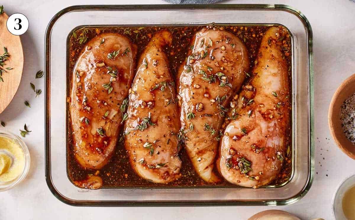 Chicken marinating in balsamic marinade from the top view.
