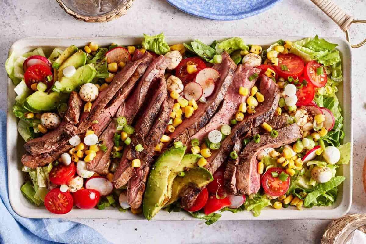 Grilled marinated flank steak salad from the top view.