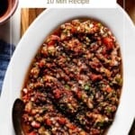 Ezme recipe on a plate with text on the image.