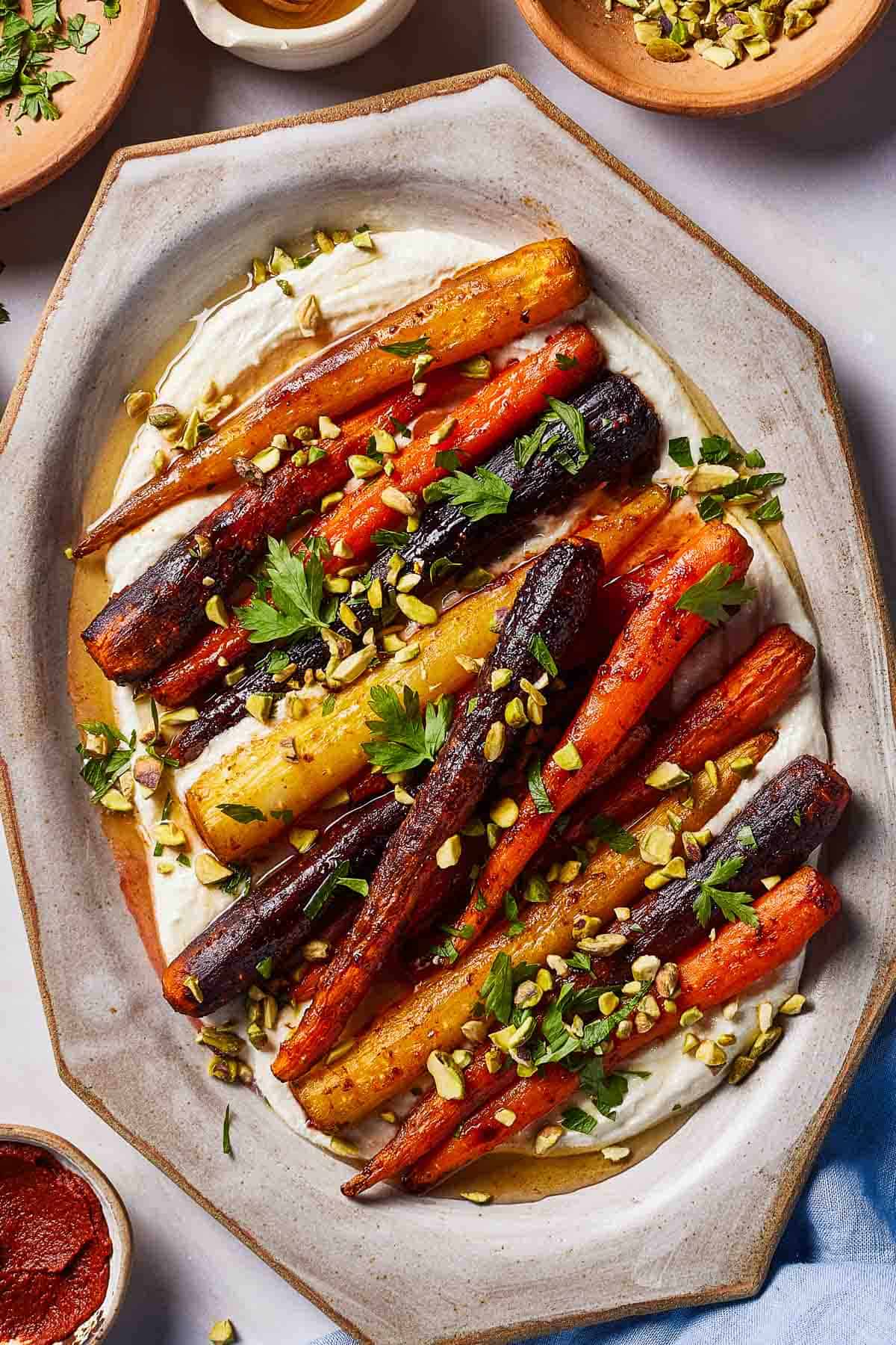 Harissa roasted carrots on a bed of whipped feta.
