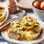 Cottage cheese egg bites on a plate with text on the image.