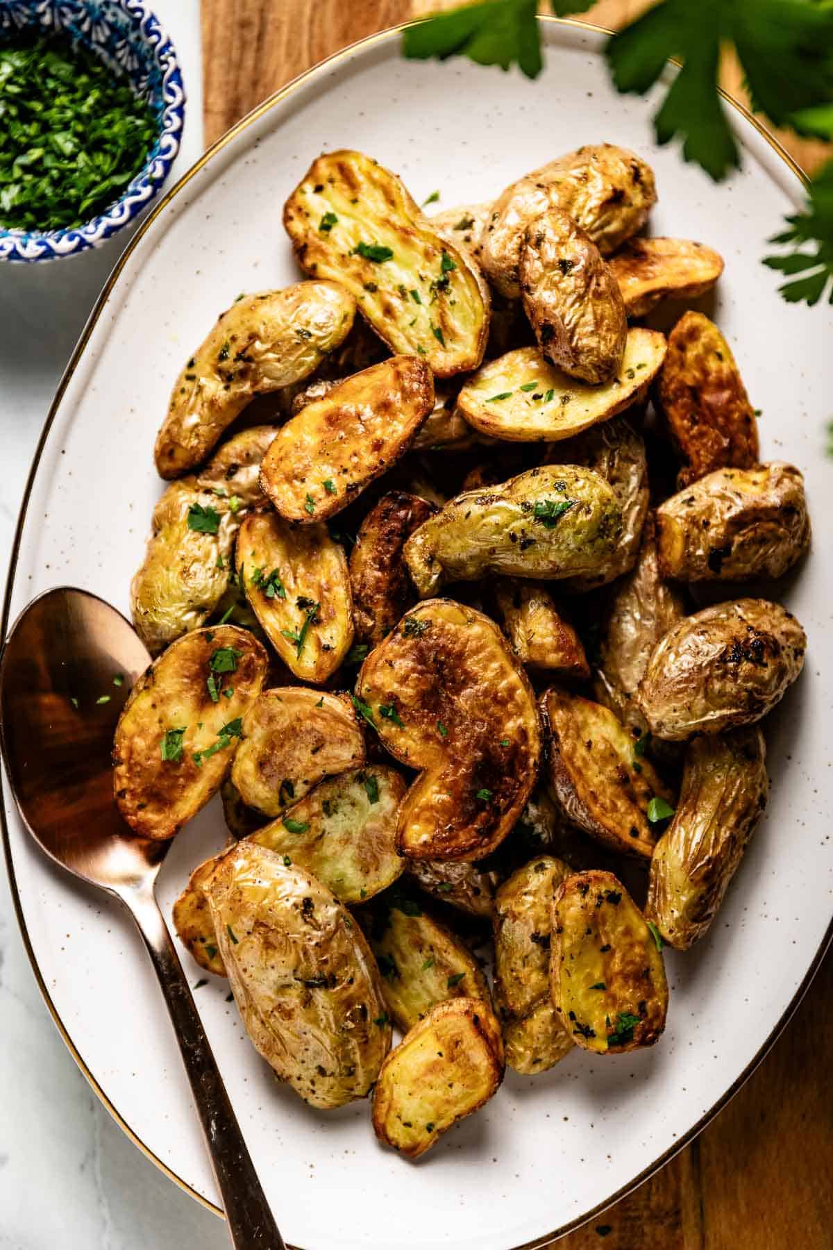 Crispy air fried fingerling potatoes from the top view.