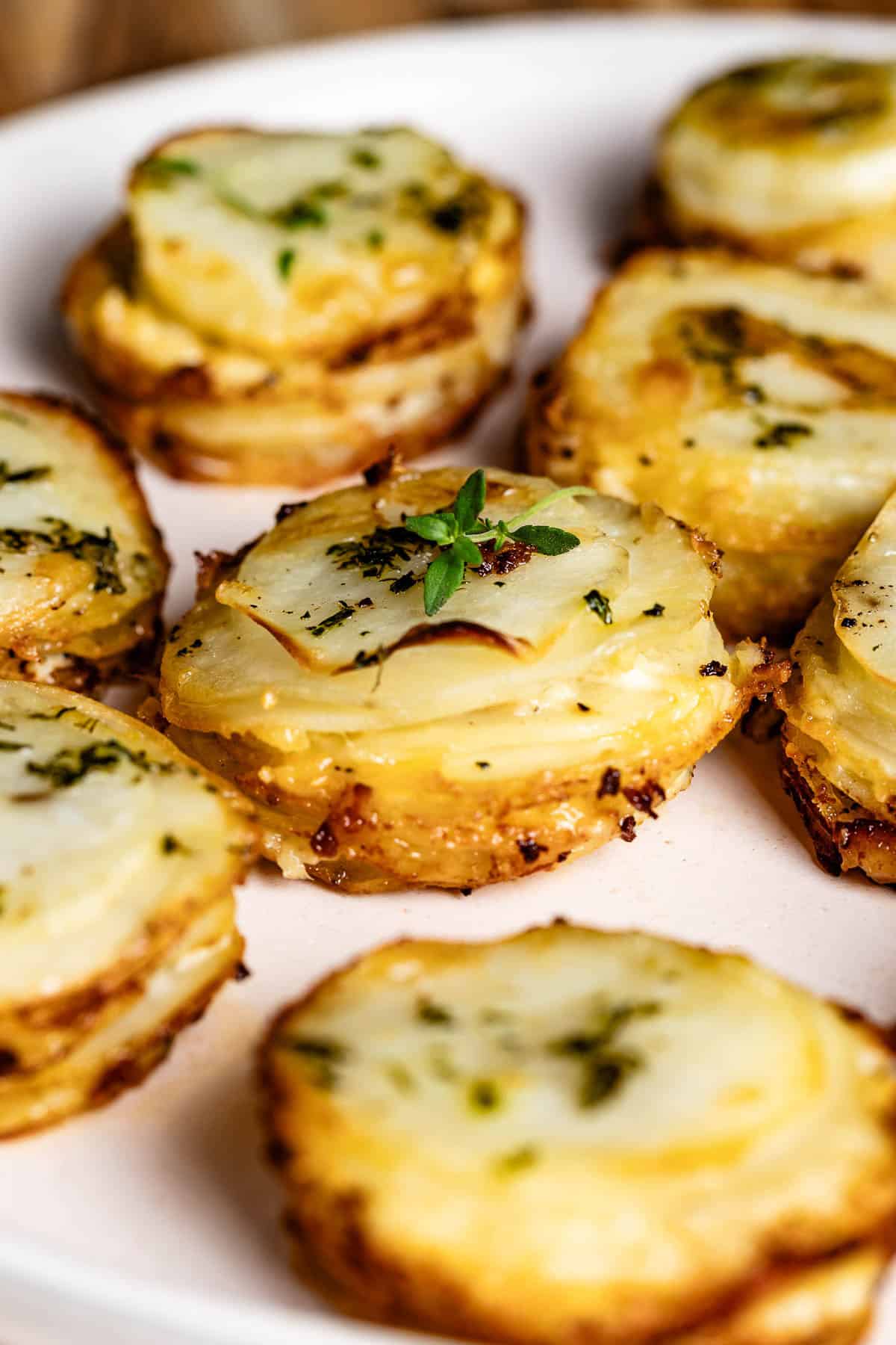 Muffin pan potatoes on a plate.