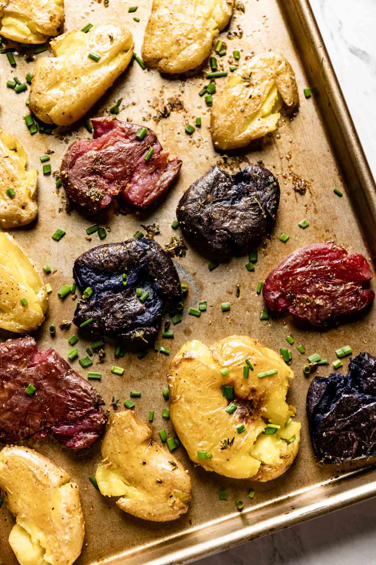 Smashed fingerling potatoes as a holiday potato side dish.