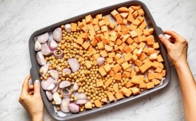 Roasted veggies on a sheet pan from the top view.