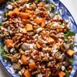 Mediterranean fall sweet potato salad on a plate from the top view.