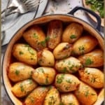 Middle Eastern stuffed onions in a large skillet from the top view.