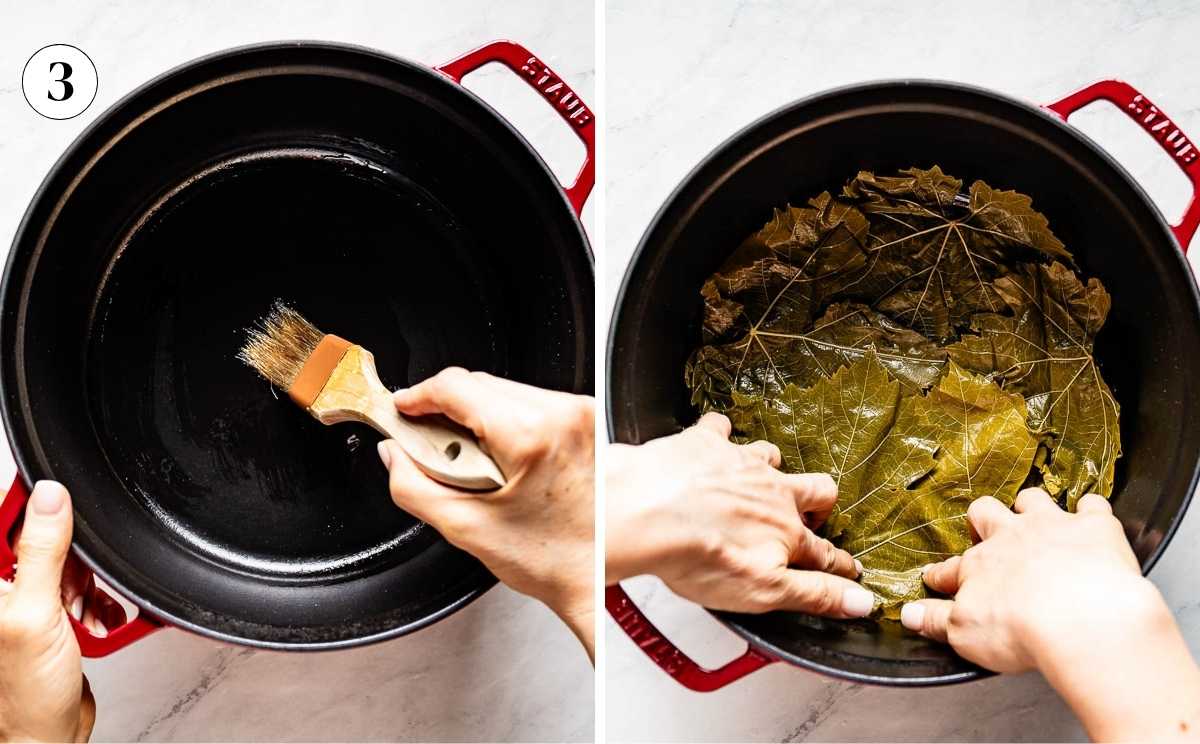 Brushing olive oil onto the bottom of a Dutch oven, then lining it with a layer of grape vine leaves before adding the rolled dolmas.